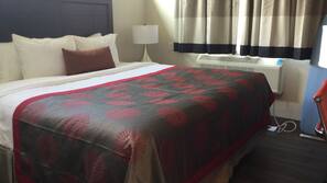 Premium bedding, memory-foam beds, desk, laptop workspace