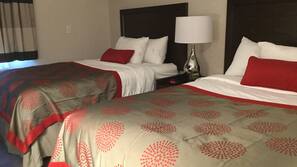 Premium bedding, memory-foam beds, desk, laptop workspace