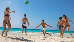 On the beach, white sand, free beach cabanas, sun loungers