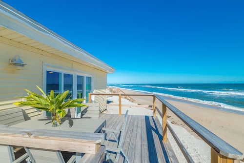 Great Place to stay Adorable Oceanfront Cottage - Step out Your Back Door to the Beach! near Melbourne Beach 