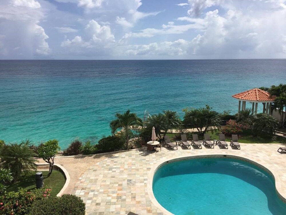 Oceanfront Condo At Rainbow Beach Club Private 2018 Room Featured Image Pool