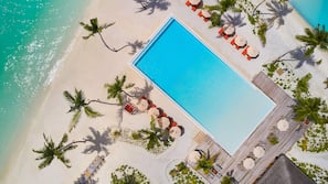 2 outdoor pools, pool umbrellas, pool loungers