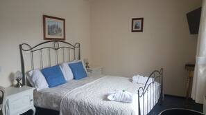 Premium bedding, Select Comfort beds, desk, iron/ironing board