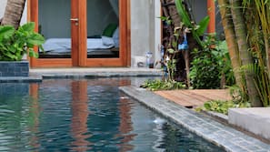 Outdoor pool, pool umbrellas, pool loungers