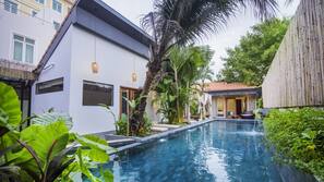 Outdoor pool, pool umbrellas, pool loungers