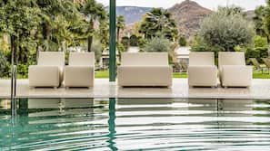 Indoor pool, outdoor pool, pool umbrellas, sun loungers