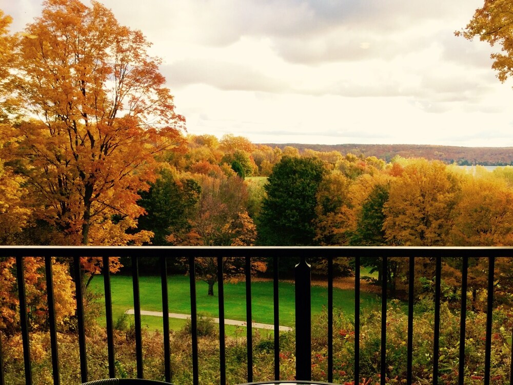 Condo Overlooking A Ga Ming Golf Resort W View Of Torch Lake 2018 Featured Image Terrace Patio