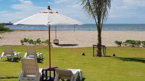 On the beach, sun loungers