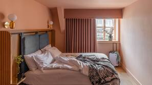 Luxe beddengoed, een kluis op de kamer, verduisterende gordijnen