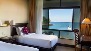 Premium bedding, desk, blackout drapes, soundproofing