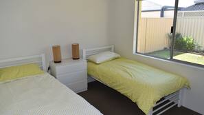 4 bedrooms, iron/ironing board, free cots/infant beds, linens
