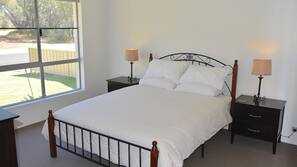 4 bedrooms, iron/ironing board, free cots/infant beds, linens