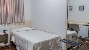 Cofres nos quartos, cortinas blackout, Wi-Fi de cortesia, roupa de cama