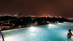 2 outdoor pools, open 8:30 AM to 10 PM, pool loungers