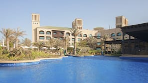 Outdoor pool, free cabanas, pool umbrellas