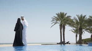 Outdoor pool, free cabanas, pool umbrellas
