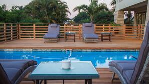 Outdoor pool, sun loungers
