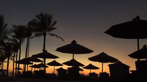 Private beach, white sand, free beach cabanas, sun-loungers
