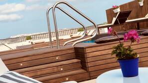 Outdoor pool, pool umbrellas, pool loungers