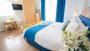 In-room safe, desk, blackout curtains, iron/ironing board