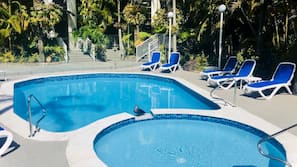 Indoor pool, outdoor pool, pool umbrellas, pool loungers