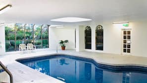 Indoor pool, outdoor pool, pool umbrellas, pool loungers