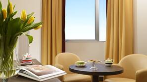 Premium bedding, down comforters, minibar, in-room safe
