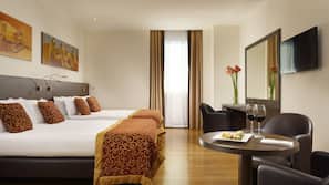 Premium bedding, down comforters, minibar, in-room safe