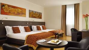 Premium bedding, down comforters, minibar, in-room safe