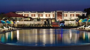 Outdoor pool, open 7:00 AM to 7:00 PM, free cabanas, pool umbrellas