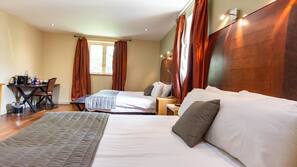 Hypo-allergenic bedding, minibar, desk, iron/ironing board