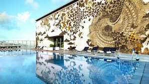 Outdoor pool, pool umbrellas, sun loungers