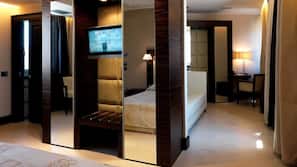 Ropa de cama de alta calidad, minibar, caja fuerte y escritorio