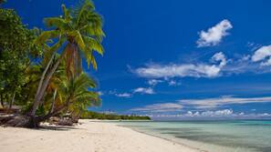 Private beach, white sand, sun-loungers, beach umbrellas