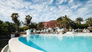 Outdoor pool, pool umbrellas, pool loungers