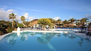 Outdoor pool, pool umbrellas, pool loungers