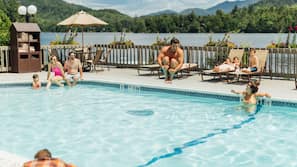 Indoor pool, 2 outdoor pools, open 7:00 AM to 10:00 PM, pool umbrellas