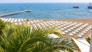 Private beach, sun-loungers, beach umbrellas, beach towels