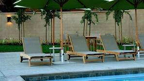 Outdoor pool, pool umbrellas, sun loungers