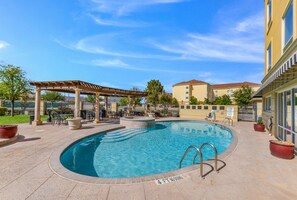 Outdoor pool, open 6:00 AM to 10:00 PM, sun loungers