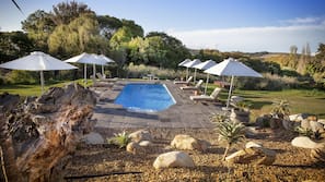 2 outdoor pools, pool umbrellas, sun loungers