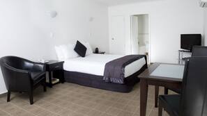 Blackout curtains, iron/ironing board, free WiFi, linens