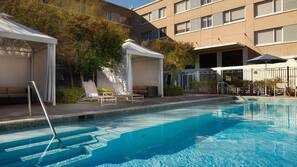 Outdoor pool, open 8 AM to 11 PM, free cabanas