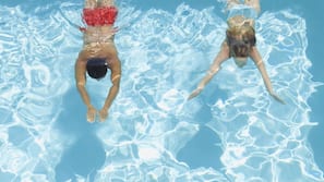 Outdoor pool, open 8 AM to 11 PM, free cabanas