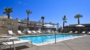 Outdoor pool, open 8 AM to 11 PM, free cabanas