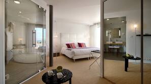 Ropa de cama de alta calidad, minibar, caja fuerte y escritorio