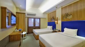 Premium bedding, in-room safe, individually decorated