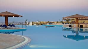 Outdoor pool, pool umbrellas, sun loungers