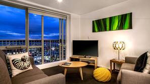 40-inch flat-screen TV with cable channels, TV