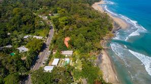 On the beach, sun loungers, beach umbrellas, beach towels